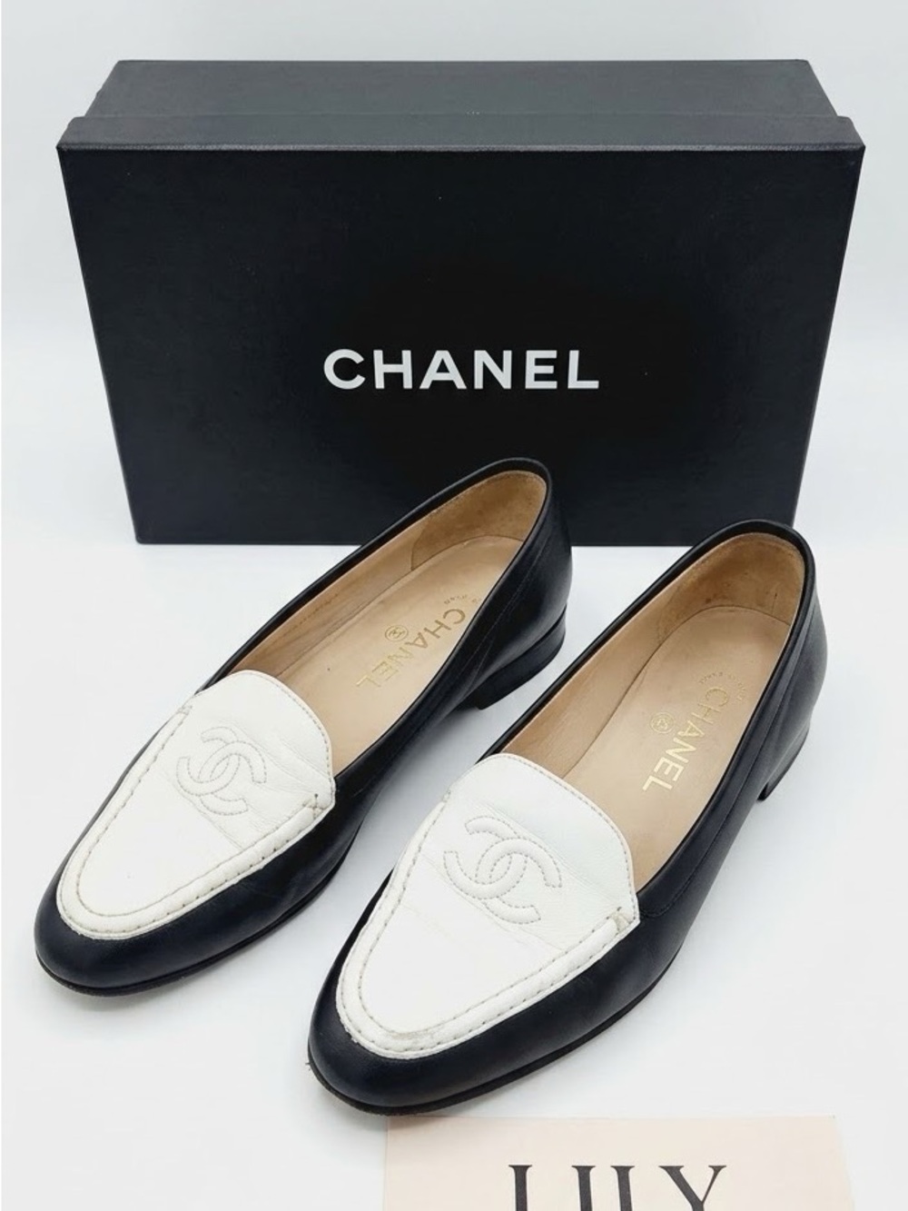 CHANEL Black & White Two-Tone Leather Loafers with CC Motif